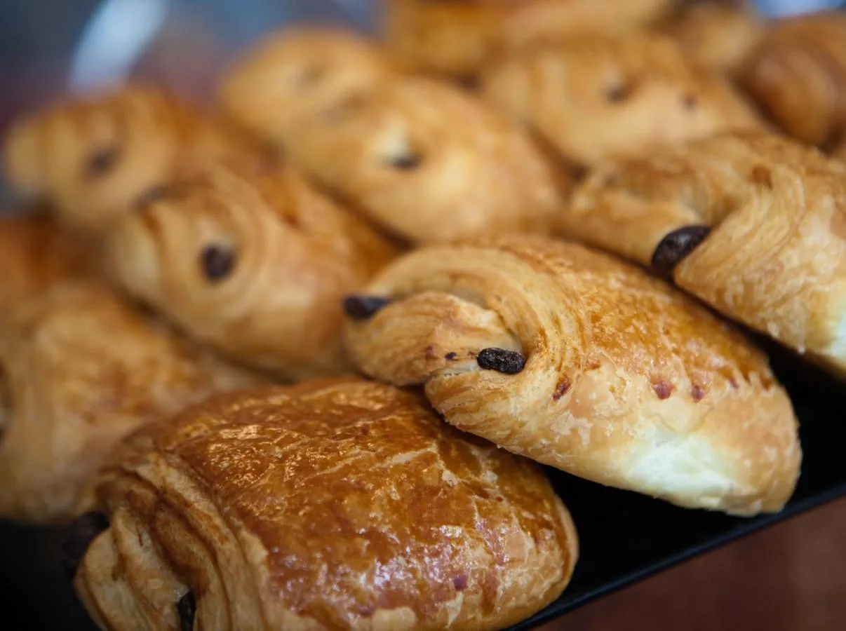 a bunch of pastries sitting on a plate at The Z Hotel Victoria in London